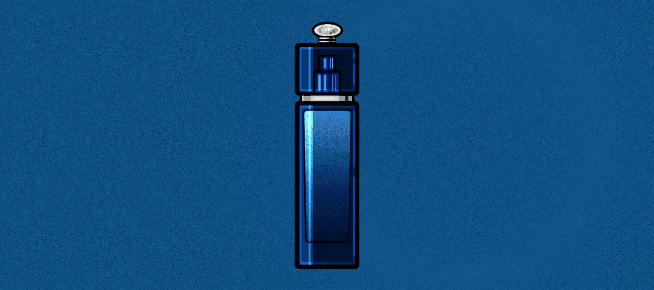 A slim Dior Addict style bottle in deep shiny blue with a silver cap, centered on a textured blue background